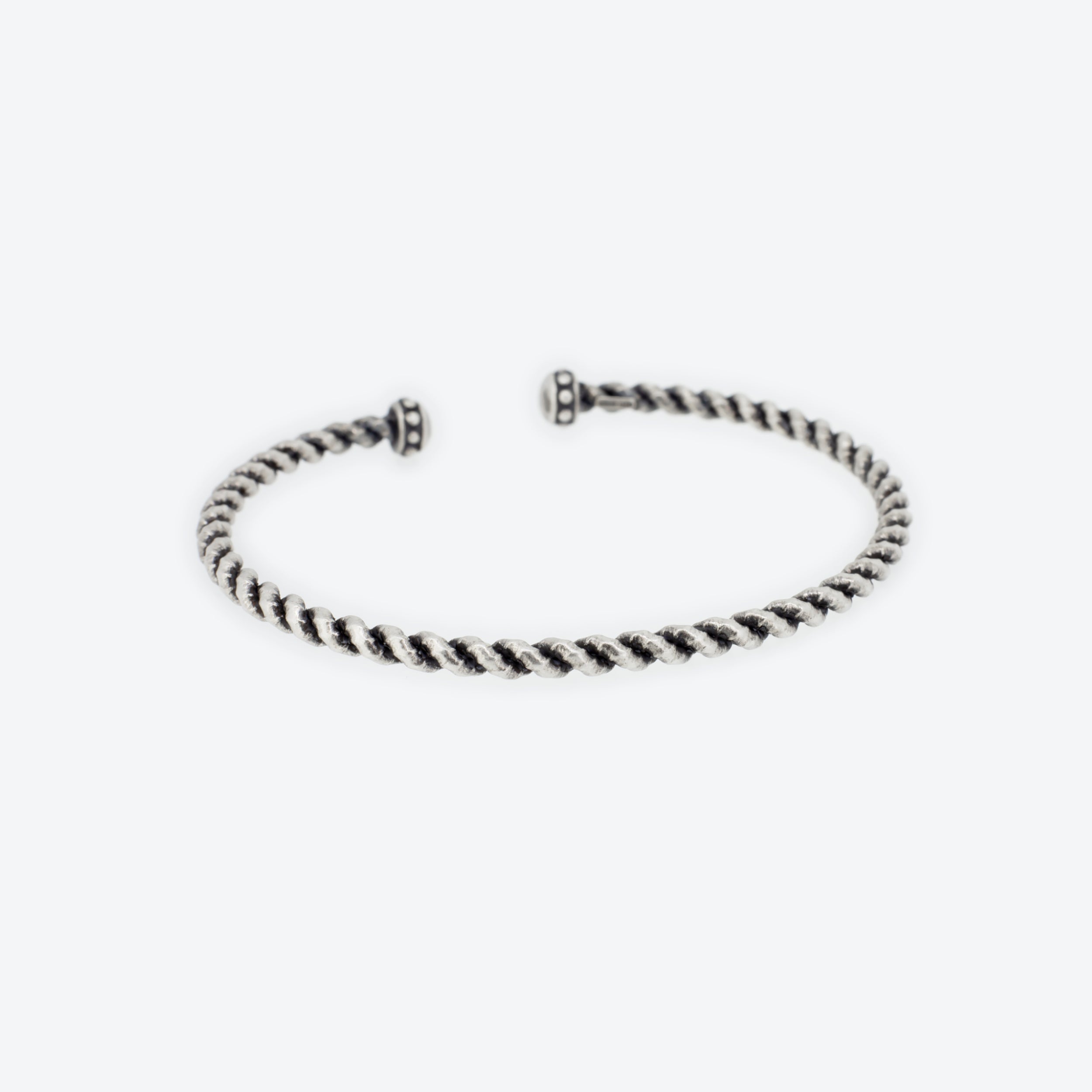 BRACCIALE rigido intrecciato