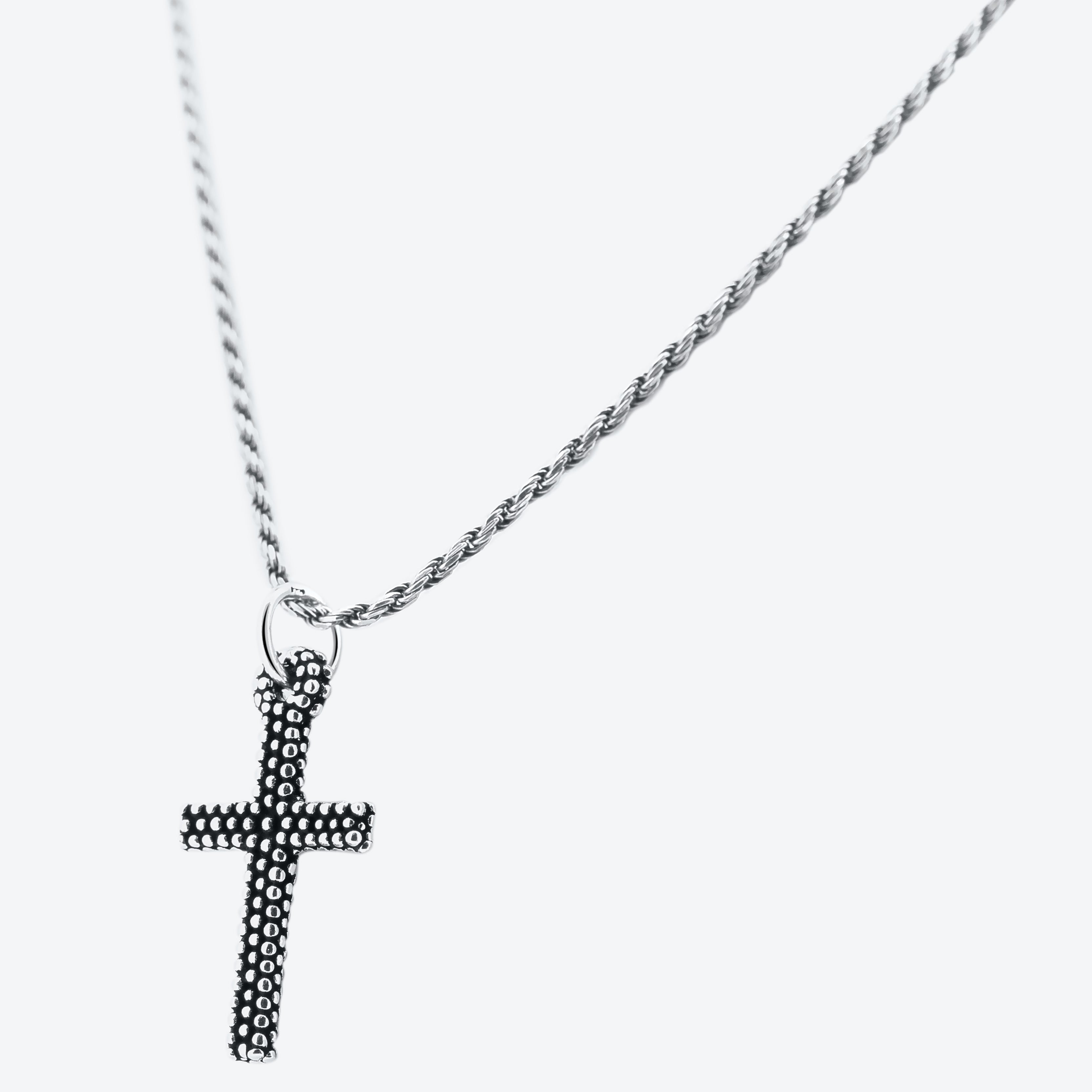 COLLANA cordoncino con pendente croce puntinata