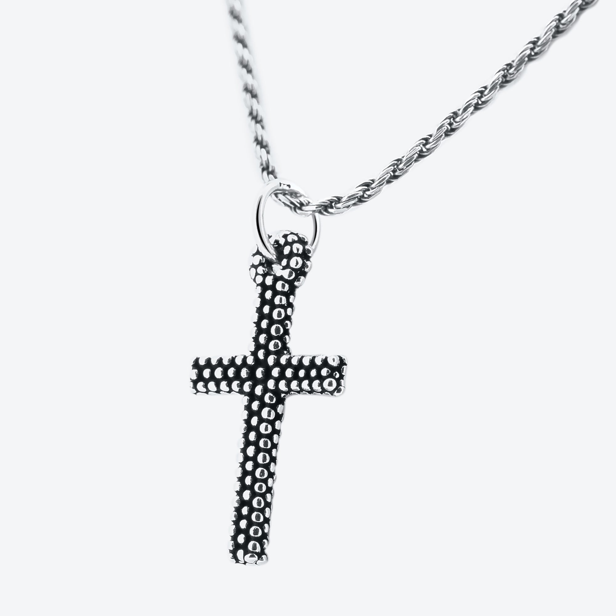 COLLANA cordoncino con pendente croce puntinata