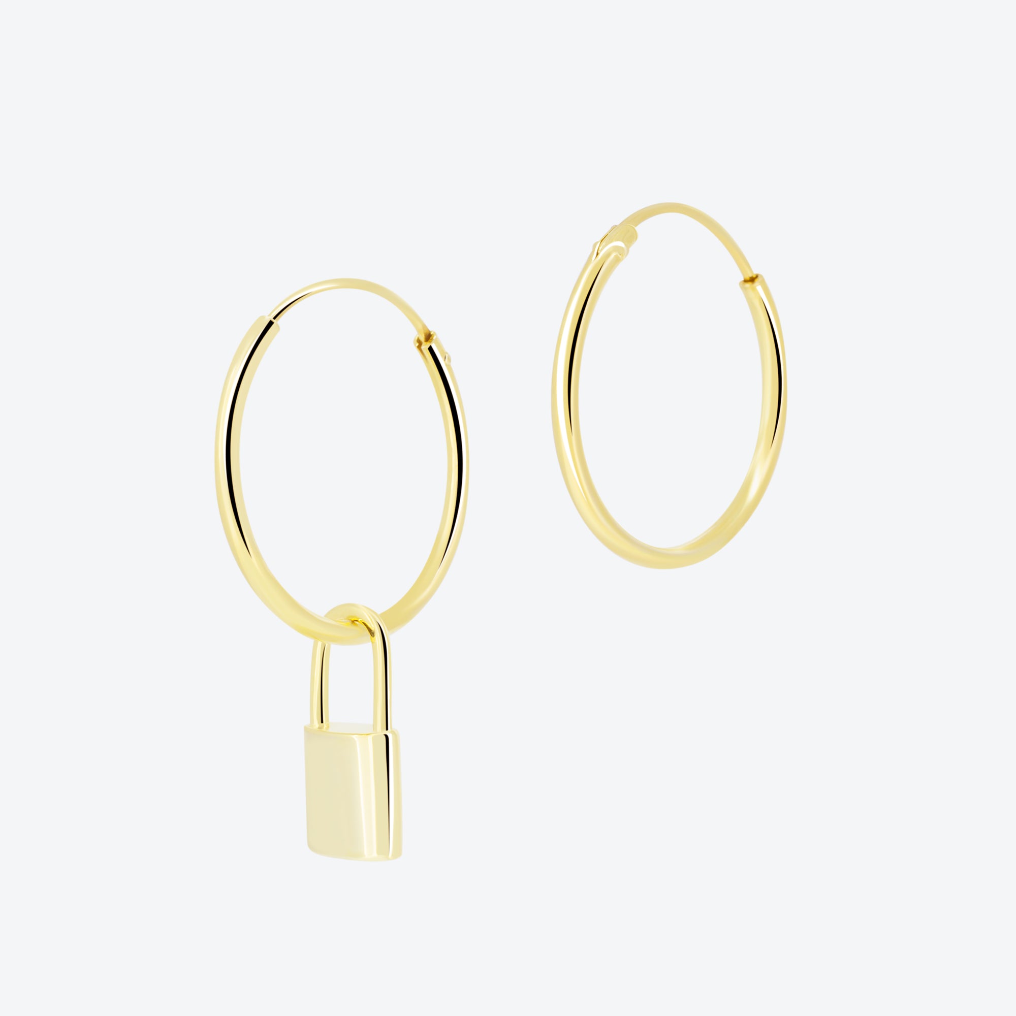 ORECCHINI cerchio con pendente chiave - oro