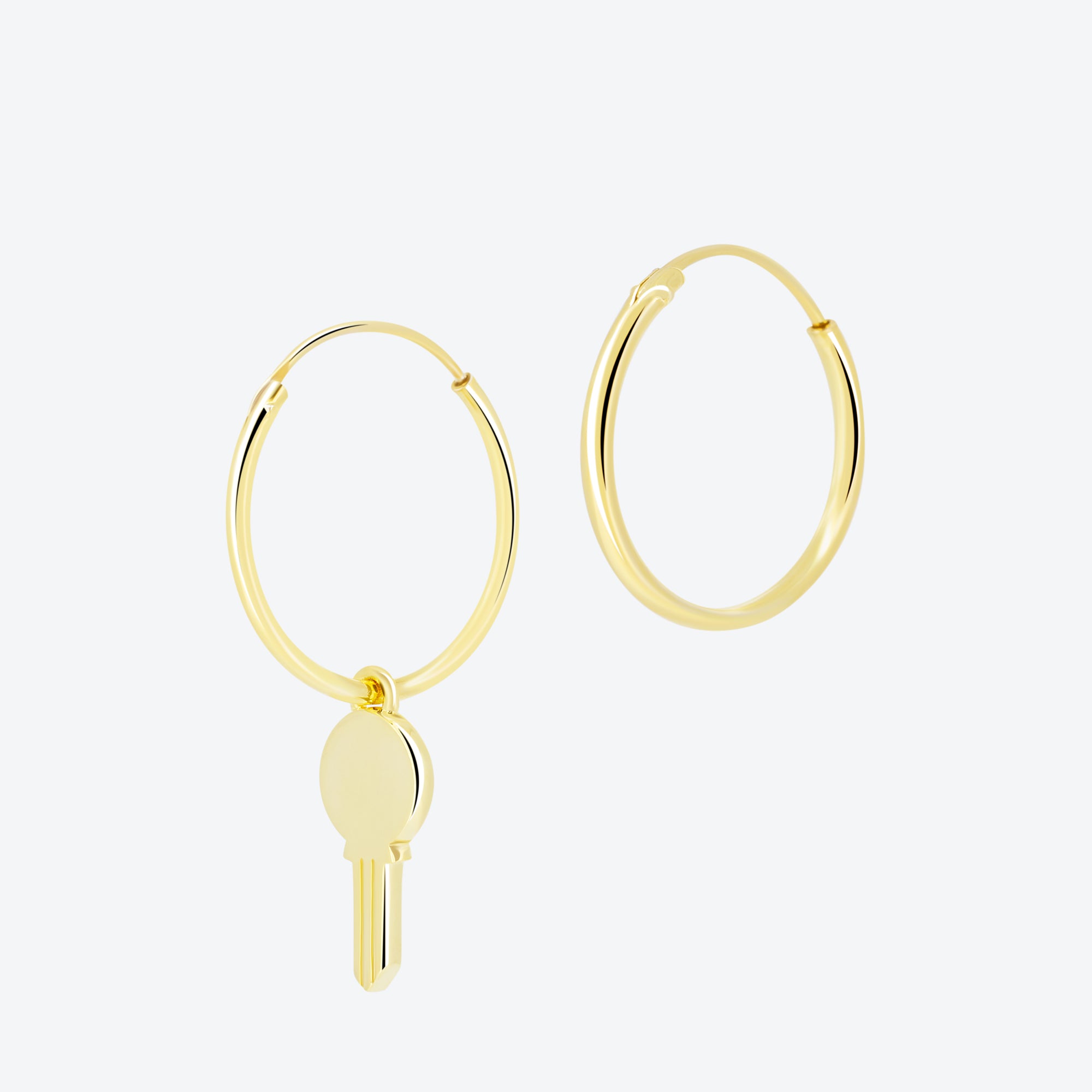 ORECCHINI cerchio con pendente chiave - oro