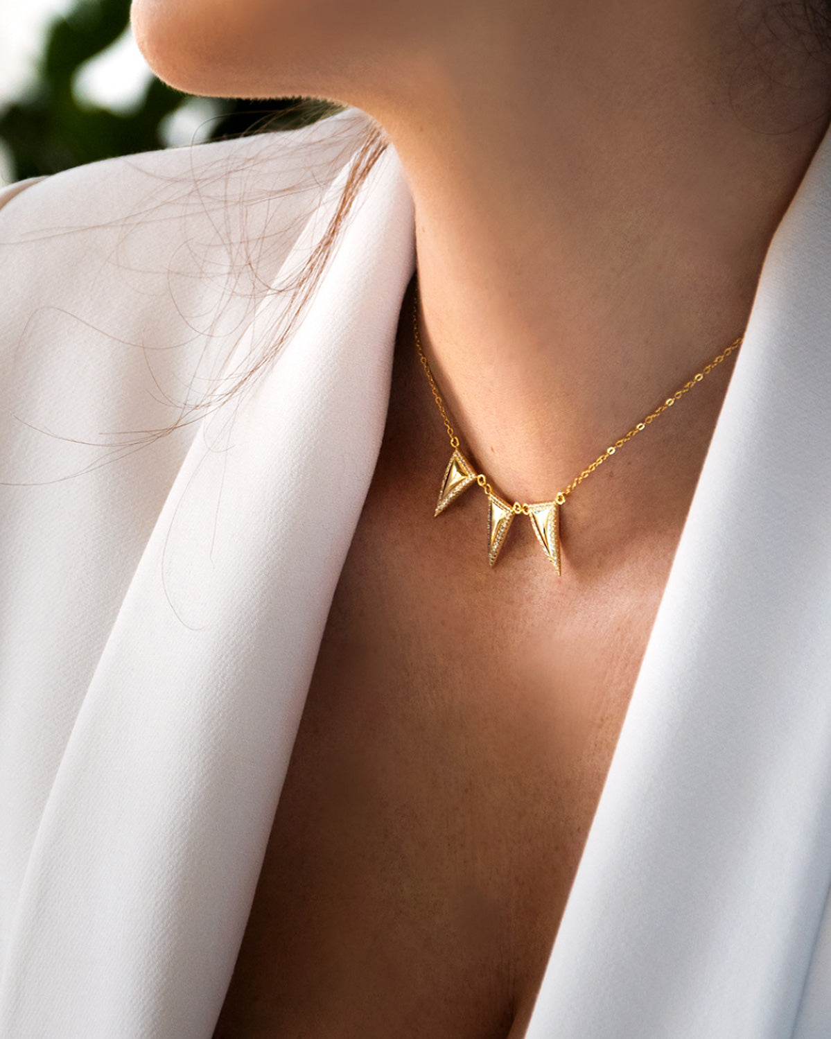 COLLANA con triangoli pavé - oro